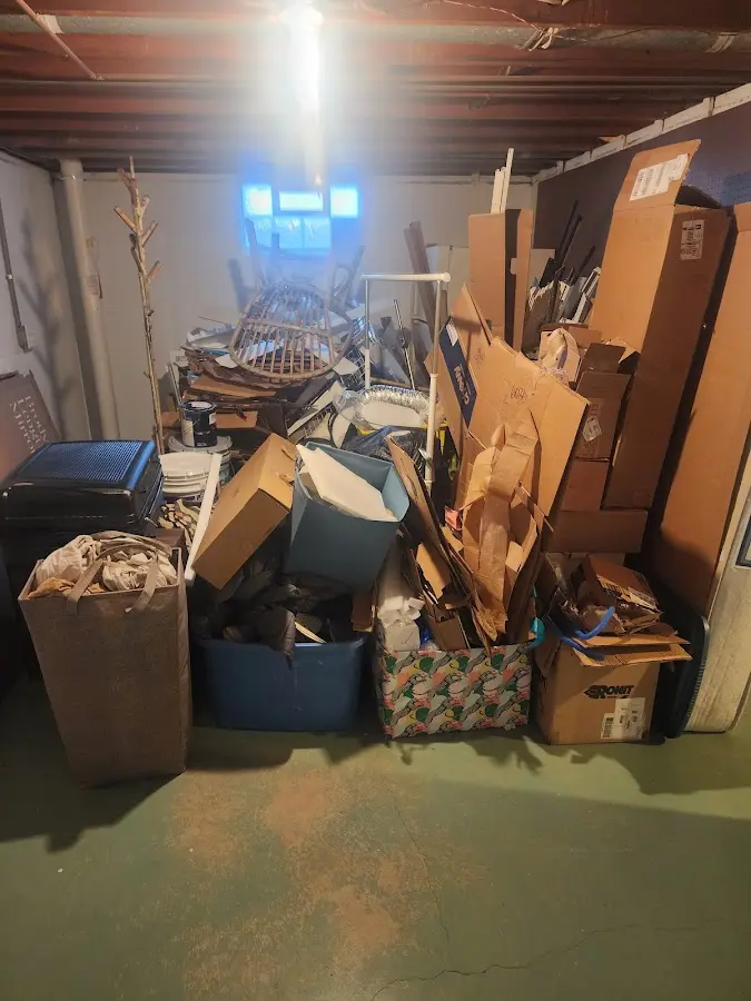 Roll-off dumpster container at job site for 2 Yard Dumpster Rental in New Haven